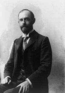 James Rush Marshall, three-quarter length portrait, seated, facing left, between 1890 and 1910. Creator: Frances Benjamin Johnston