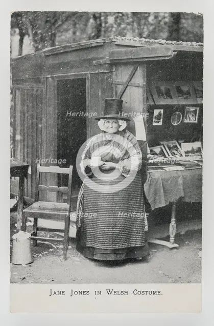 Jane Jones in Welsh Costume at her bookstall in Betws-y-coed, c1910. Creator: Unknown.