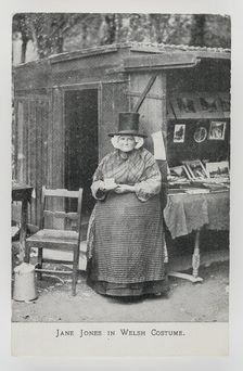 Jane Jones in Welsh Costume at her bookstall in Betws-y-coed, c1910. Creator: Unknown