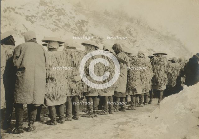 Japanese coolies in winter costume, c1904. Creator: Robert Lee Dunn.