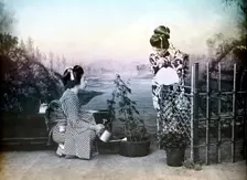 Japanese girls playing in a garden, 1880. Creator: Unknown