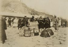 Japanese Hospital Corps landing medical and surgical supplies at Chemulpo, c1904. Creator: Robert Lee Dunn
