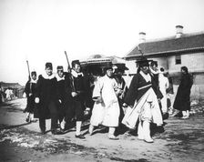 Japanese official with an escort of soldiers, Korea, c1900