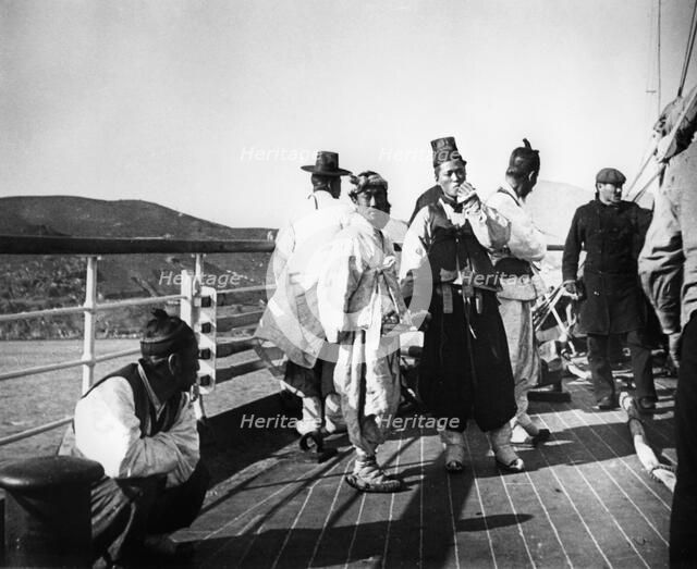 Japanese officials on board a ship, Korea, 1900. Artist: Unknown