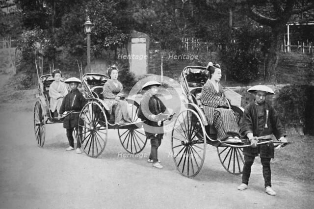 Japanese ladies in rickshaws drawn by coolies, 1902. Artist: Unknown.