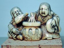 Japanese Netsuke of two drunkards, 18th century. Artist: Gyoku-un