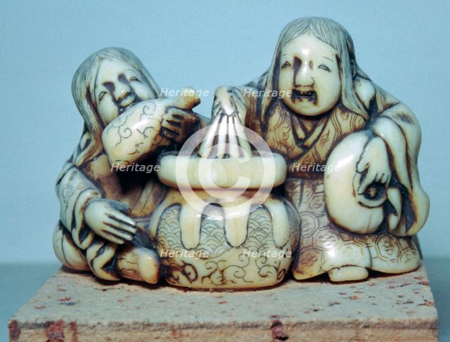 Japanese Netsuke of two drunkards, 18th century.  Artist: Gyoku-un
