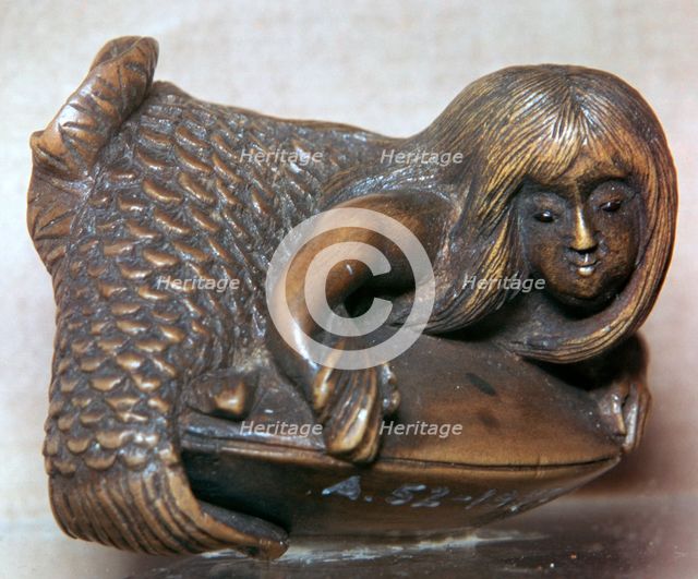Japanese Netsuke of a mermaid on a clam, 18th century. Artist: Unknown