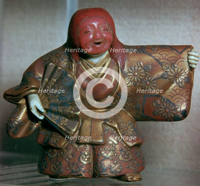 Japanese Netsuke of a No dancer as a Shojo. Artist: Masahira