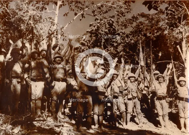 Japanese soldiers celebrate victory, Bataan, Philippines, World War II, 1942. Creator: Unknown.