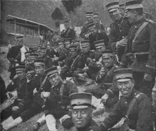 Japanese soldiers on the way to the front: the noonday meal of tea and rice, 1904-1905 (1907)