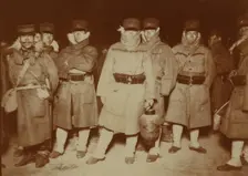 Japanese soldiers landed at Chemulpo after naval battle, waiting on a beach to entrain..., c1904. Creator: Robert Lee Dunn