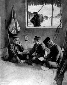 Japanese soldiers using a field telephone to call for reinforcements, Korea. Creator: Unknown