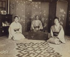 Japanese servants O Hero San, O Eun San, and O Sok San with tea utensils in the..., 1899. Creator: Eleanor Lord Pray