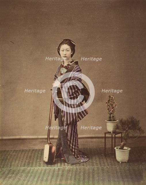 [Japanese Woman in Traditional Dress Posing with Instrument], 1870s. Creator: Unknown.