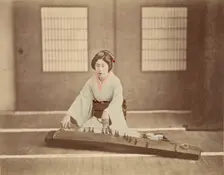 Japanese Woman Playing a Koto, 1865-1875. Creator: Unknown