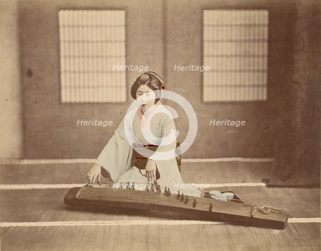 Japanese Woman Playing a Koto, 1865-1875. Creator: Unknown.