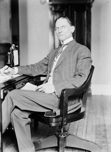 Jasper Baker, Assistant Director of The Mint, 1913. Creator: Harris & Ewing