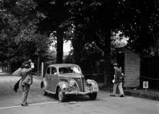 JB Thompson's Ford V8 on the way to winning bronze in the MCC Torquay Rally, July 1937. Artist: Bill Brunell