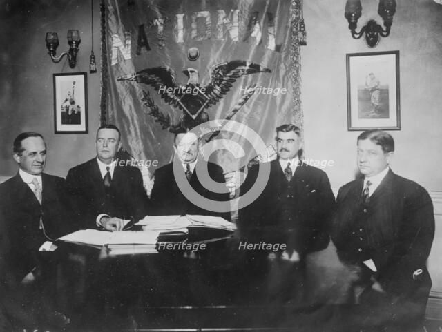 J.E. Bruce, Ban Johnson, A. Herrmann, T.J. Lynch, J.A. Heydler at table together, 1910. Creator: Bain News Service.