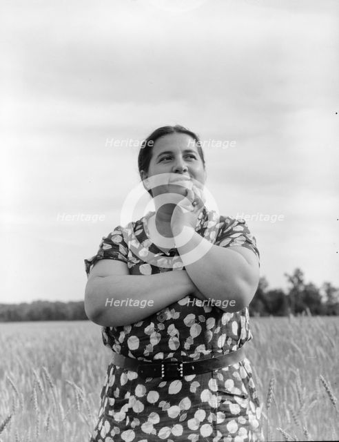 Jewish-American farm mother, Mrs. Cohen, wife of the farm manager, Hightstown, New Jersey, 1936. Creator: Dorothea Lange.