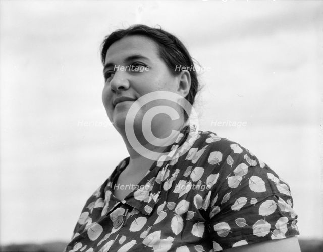 Jewish-American farm mother, Mrs. Cohen, wife of the farm manager, Hightstown, New Jersey, 1936. Creator: Dorothea Lange.