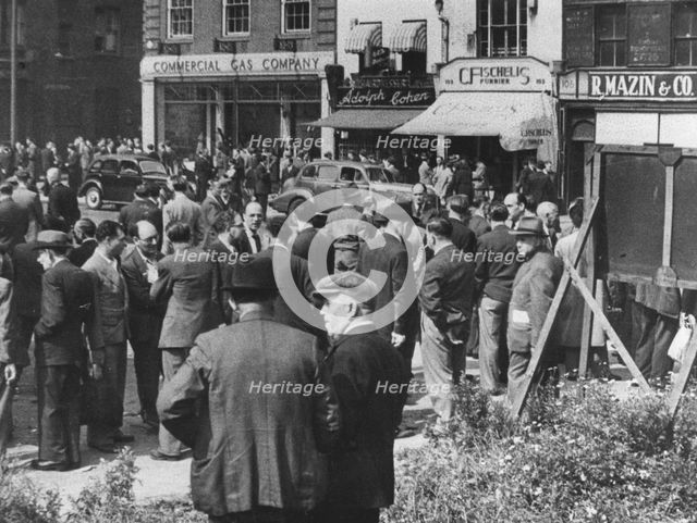 Jewish tailors looking for employment, Whitechapel Road, London, c1940s. Creator: Unknown.