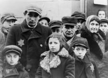 Jews wearing Star of David badges, Lodz Ghetto, Poland, 1940-1944. Creator: Unknown