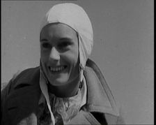 Jean Batten in Flying Gear Smiling to Crowds, 1930s. Creator: British Pathe Ltd