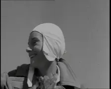 Jean Batten in Flying Gear Smiling to Crowds, 1930s. Creator: British Pathe Ltd