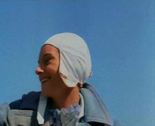 Jean Batten in Flying Gear Smiling to Crowds, 1930s. Creator: British Pathe Ltd