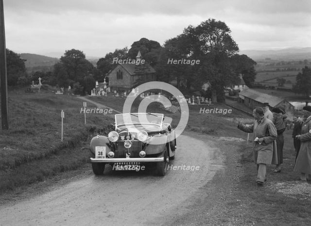 Jensen open 4-seater of Ken Crawford competing in the South Wales Auto Club Welsh Rally, 1937 Artist: Bill Brunell.