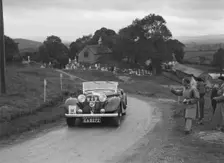 Jensen open 4-seater of Ken Crawford competing in the South Wales Auto Club Welsh Rally, 1937 Artist: Bill Brunell