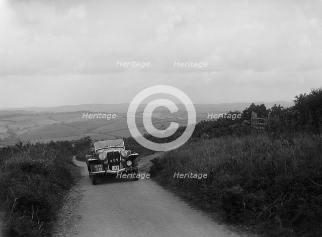 Jensen V8 of Alan Whiddington competing in the MCC Torquay Rally, 1938. Artist: Bill Brunell.