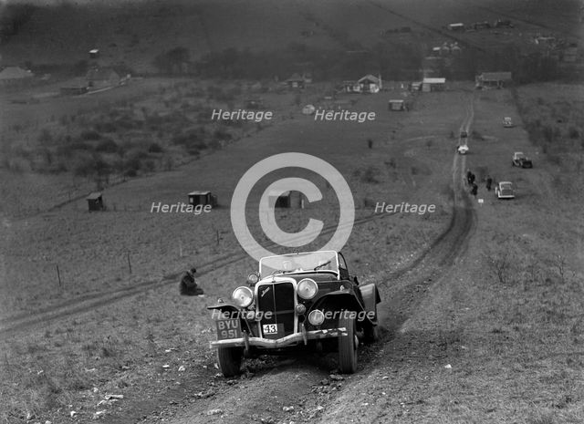 Jensen V8 competing in the London Motor Club Coventry Cup Trial, Knatts Hill, Kent, 1938. Artist: Bill Brunell.