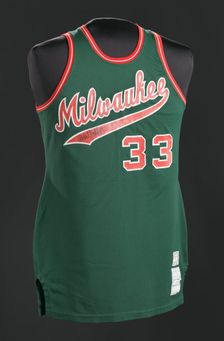 Jersey for the Milwaukee Bucks worn and signed by Kareem Abdul-Jabar, 1973-1975. Creator: Sand-Knit