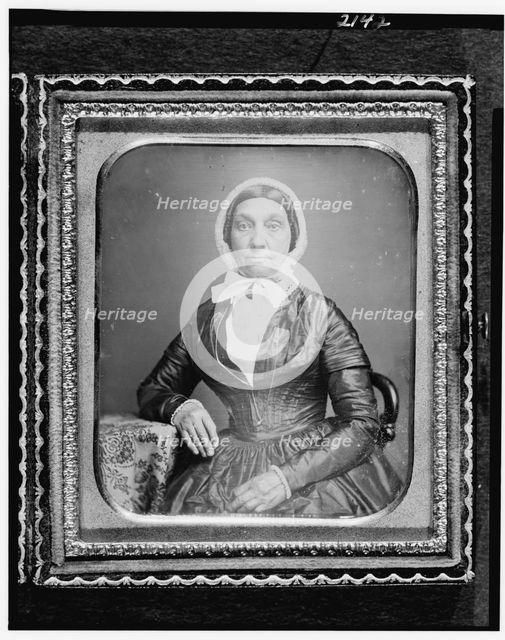 Jerusha Field, half-length portrait, seated in chair, with arm resting..., between 1840 and 1860. Creator: Unknown.
