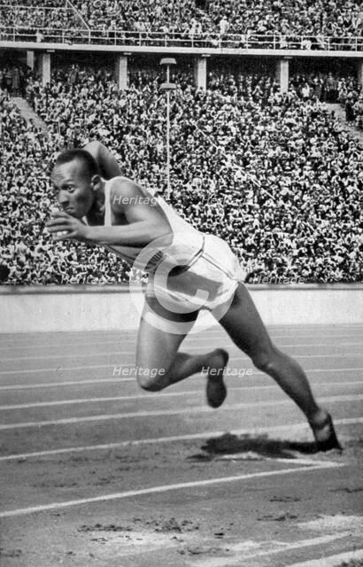 Jesse Owens at the start of the 200 metres at the Berlin Olympic Games, 1936. Artist: Unknown