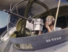 Jesse Rhodes Waller, A.O.M., third class, tries out a 30-calibre...Corpus Christi, Texas, 1942. Creator: Howard Hollem