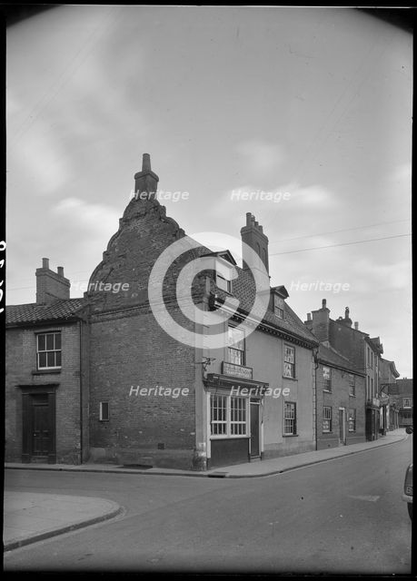 JH Bloom, Butcher's Shop, Church Street, North Walsham, North Norfolk, Norfolk, 1947. Creator: Herbert Felton.