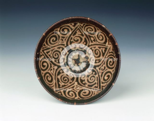 Jizhou bowl with stylised open flower, Yuan dynasty, China, late 13th-early 14th century. Artist: Unknown