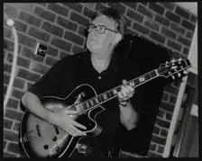 Jim Mullen playing guitar at The Fairway, Welwyn Garden City, Hertfordshire, 3 August 1997. Creator: Denis Williams