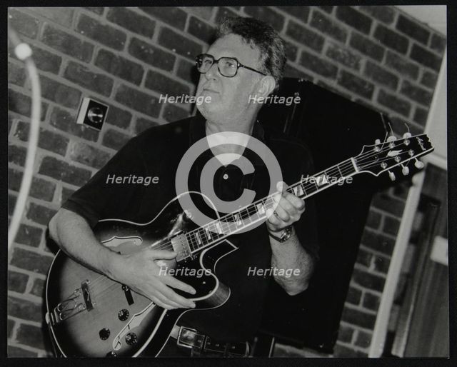 Jim Mullen playing guitar at The Fairway, Welwyn Garden City, Hertfordshire, 3 August 1997. Creator: Denis Williams.