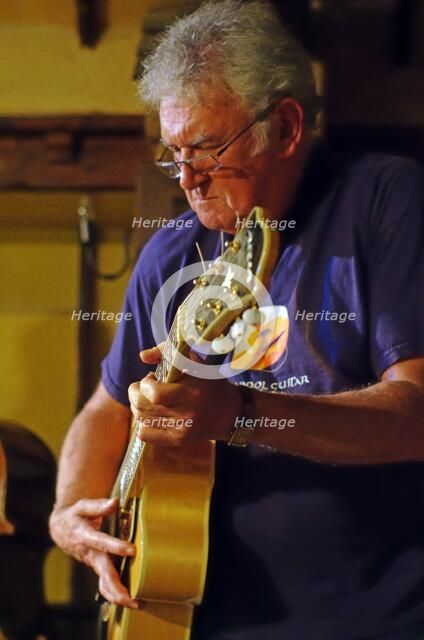 Jim Mullen, Scottish jazz guitarist, The Woodman, Ide Hill, Kent, 2012. Artist: Brian O'Connor.