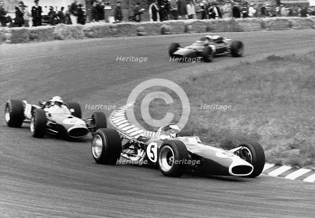 Jim Clark driving his Lotus 49 R3 DFV at the Dutch Grand Prix, Zandvoort, Netherlands, 1967. Creator: Unknown.