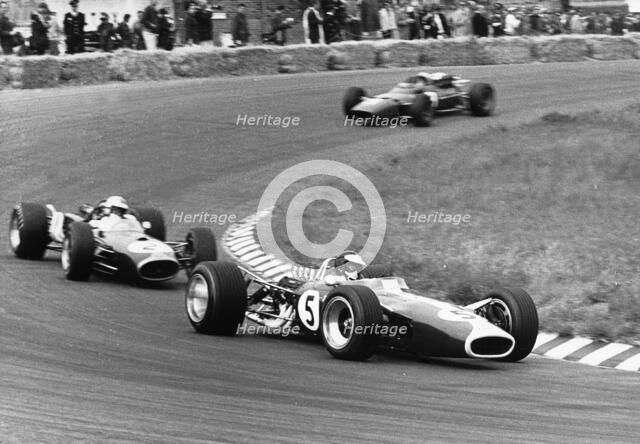 Jim Clark driving his Lotus 49 R3 DFV at the Dutch Grand Prix, Zandvoort, Netherlands, 1967. Creator: Unknown.