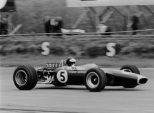 Jim Clark driving the Lotus 49 at the British Grand Prix, Silverstone, 1967