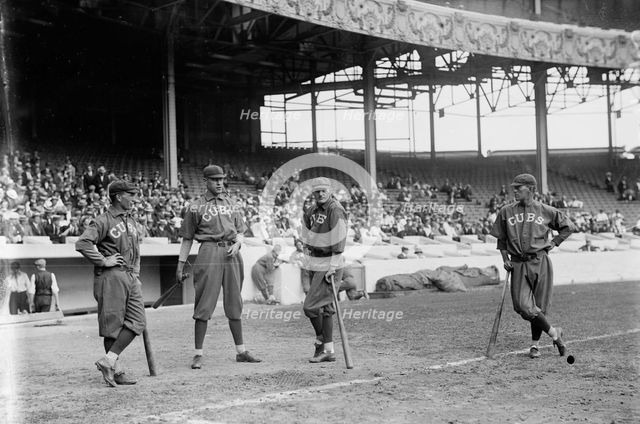 Jimmy Lavender, Ward Miller, Charlie Smith, Tommy Leach, Chicago NL, at Polo Grounds, NY, 1913. Creator: Bain News Service.
