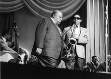 Jimmy Rushing and the Basie Band; with Frank Wess, London, 1963. Creator: Brian Foskett