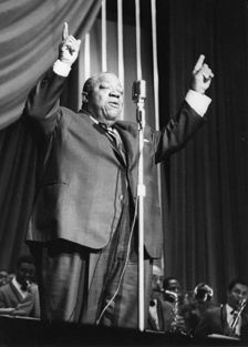 Jimmy Rushing and the Basie Band; with Frank Wess, London, 1963. Creator: Brian Foskett